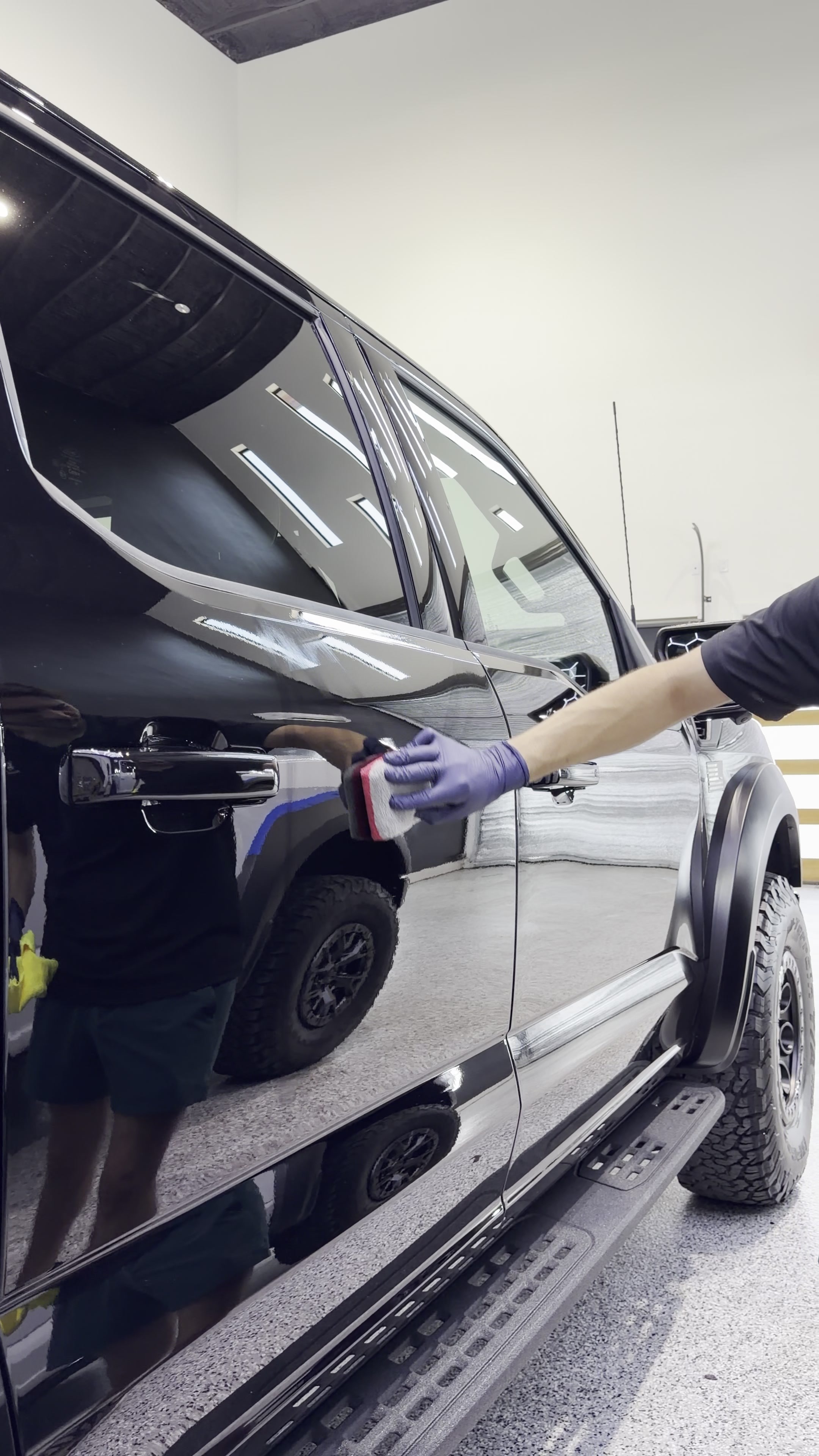 Ceramic coating application on a vehicle door